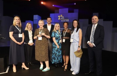 NHS Excellence Awards group award on stage