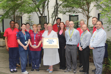 group picture with cake.png