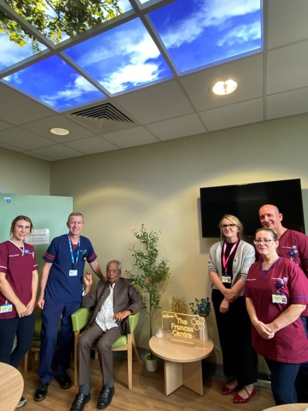 New dementia-friendly Frances Centre opening at the Royal with staff in uniform and Professor Ananda Dulal Sarkar.